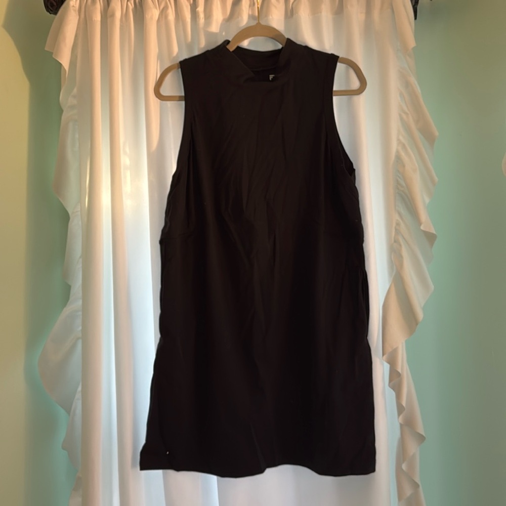 High neck loose-fitting athletic dress (no shorts underneath)